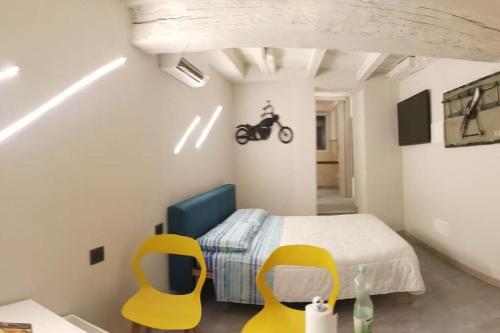 Postel nebo postele na pokoji v ubytování A due passi dal castello