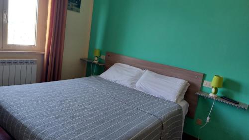 Katil atau katil-katil dalam bilik di Agriturismo La Terrazza