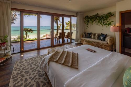 Cama ou camas em um quarto em Mi Amor Tulum, a Small Luxury Hotel