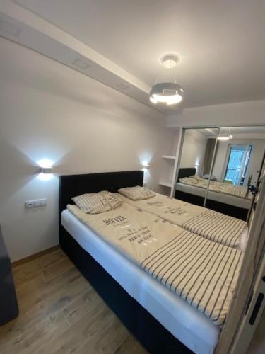 Voodi või voodid majutusasutuse Apartament nad morzem toas