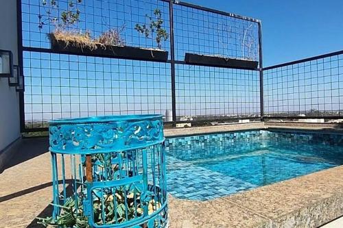Bazén v ubytování Cobertura com Piscina Exclusiva nebo v jeho okolí