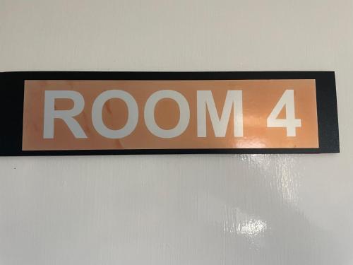 a room sign hanging on a wall at The York in Morecambe
