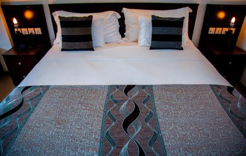 Cama o camas de una habitación en Riverside Inn Fuji