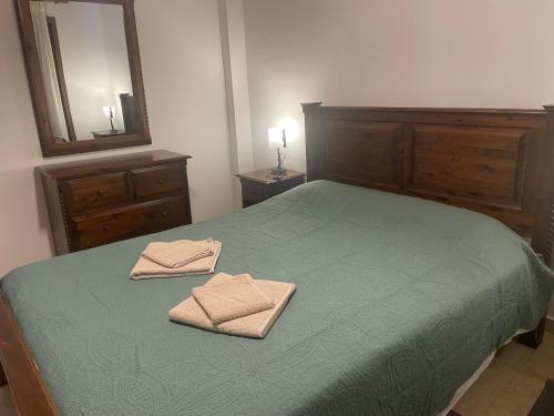 Postel nebo postele na pokoji v ubytování Omodos Katoi Holiday Homes