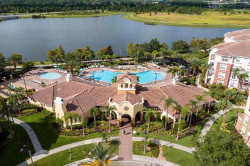 an aerial view of a house with a swimming pool at Wonderful Apt Convention Center VistaCay VC50253 in Orlando