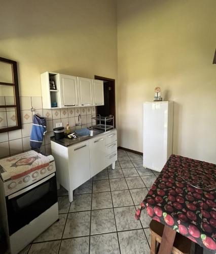 Η κουζίνα ή μικρή κουζίνα στο Casa Pomar do Aconchego