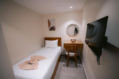 TV a/nebo společenská místnost v ubytování Makai Pyramids Guest House