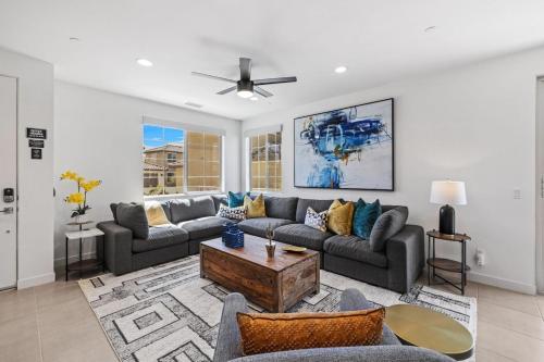 a living room with couches and a coffee table at PGA West 65 - 3 bdrm w/Loft, Sleeps 8, Pool, Gym in La Quinta