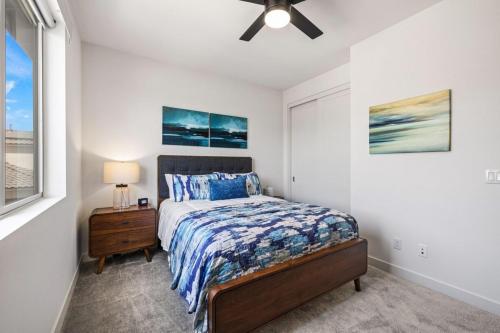 a bedroom with a bed and a ceiling fan at PGA West 65 - 3 bdrm w/Loft, Sleeps 8, Pool, Gym in La Quinta