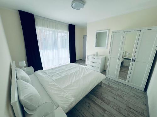 Cama o camas de una habitación en Ivy Central Residence