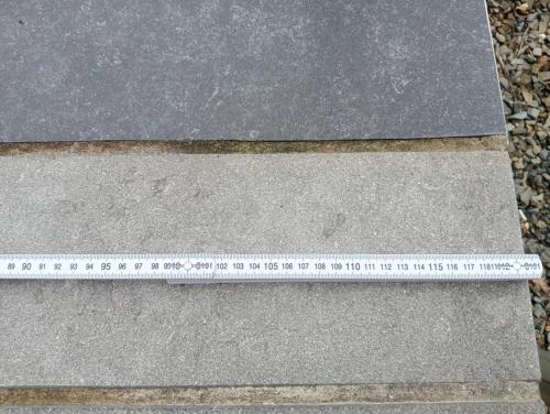 a ruler sitting on top of a concrete sidewalk at Tranquil Retreat in Hamoir, Belgium - Perfect for Families Friends in Hamoir