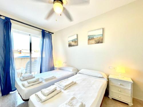 Katil atau katil-katil dalam bilik di Cozy Stay Near Roquetas