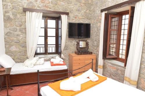 A bed or beds in a room at Villa Castello