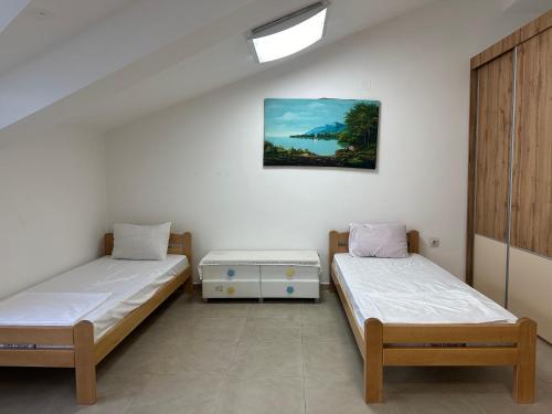 Postel nebo postele na pokoji v ubytování Apartment Cece