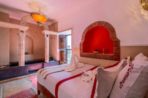 Postel nebo postele na pokoji v ubytování Riad Zehar & Spa Marrakech