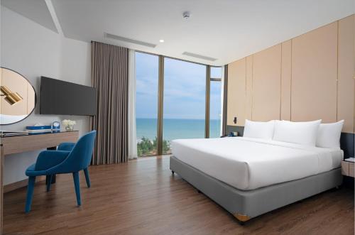 Cama o camas de una habitación en Poseido Hotel Quảng Bình