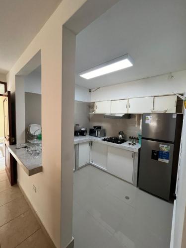 Dapur atau dapur kecil di Departamento Confort y Seguridad en Exclusiva Zona de Piura, Frente a Parque y Cerca de Todo