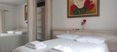 Una cama o camas en una habitación de Quarto ideal p um bom descanso
