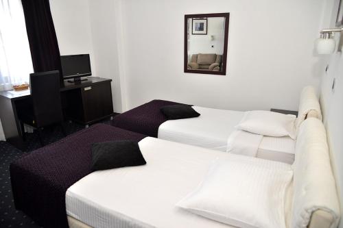 Кровать или кровати в номере Guest House Amico
