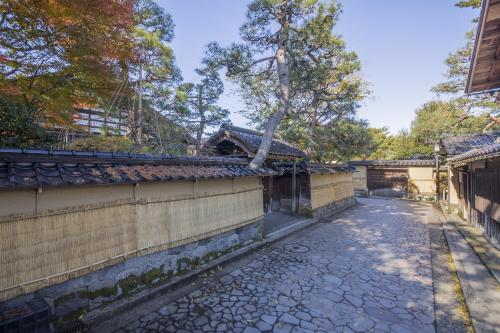 an empty street in a japanese garden at Tmark City Hotel Kanazawa in Kanazawa