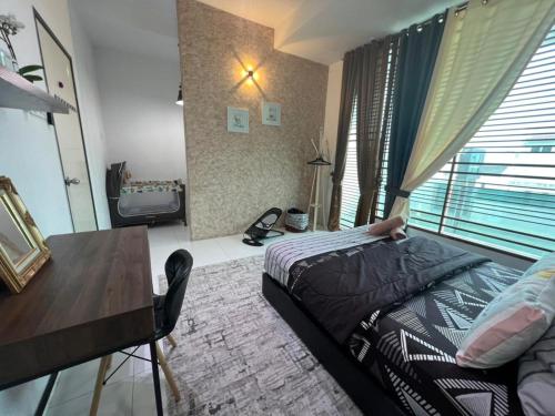 a bedroom with a bed and a desk and a window at Homestay banglo 4 bilik aircond dan ruang tamu aircond 500meter dari HSB in Alor Setar