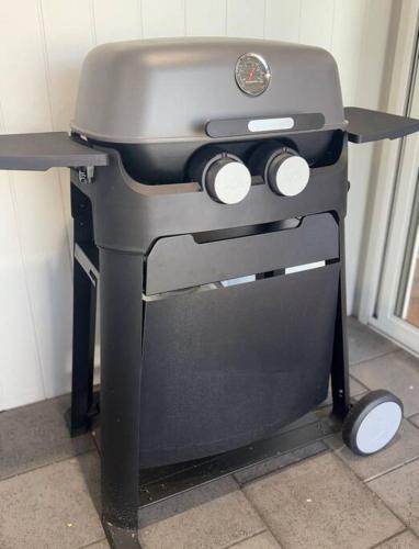 a grill sitting on a table in a kitchen at The Warra House in Dubbo