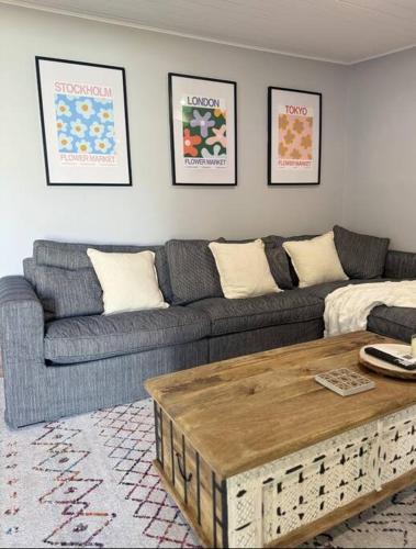 a living room with a couch and a coffee table at The Warra House in Dubbo