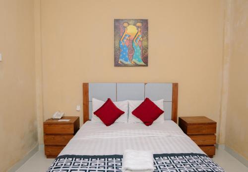 Katil atau katil-katil dalam bilik di Dante Guesthouse