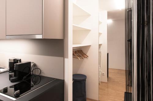 Kuchyň nebo kuchyňský kout v ubytování Happy Stay Rentals