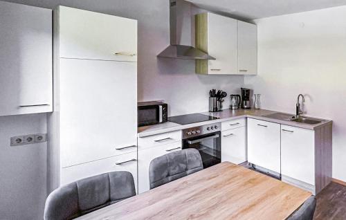 Una cocina o cocineta en Ferienwohnung - Roppen