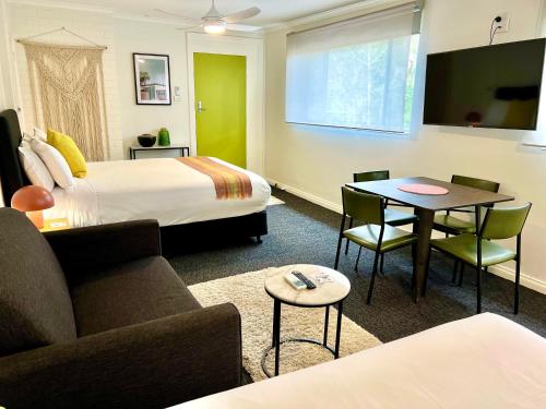 Ένα ή περισσότερα κρεβάτια σε δωμάτιο στο Warburton Motel