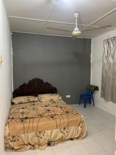 Katil atau katil-katil dalam bilik di ARIDAWA Homestay