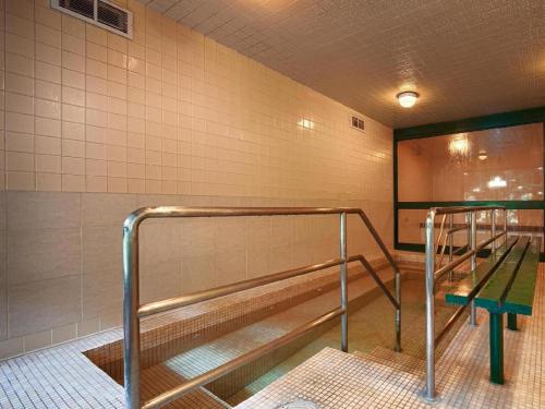 Palanda nebo palandy na pokoji v ubytování Baton Rouge Hotel