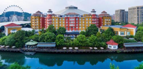 a model of a city with a river and buildings at Hangzhou The First World Hotel in Hangzhou