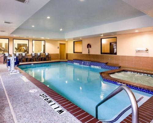 a large swimming pool in a hotel room at Comfort Suites near NASA - Clear Lake in Webster