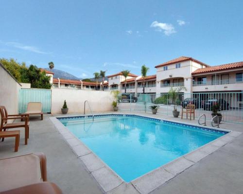 a swimming pool in the middle of a building at Quality Inn Near City of Hope in Los Angeles