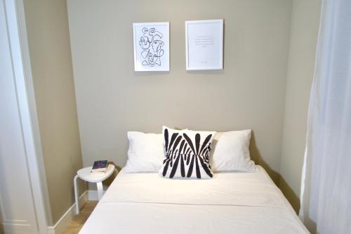 Ένα ή περισσότερα κρεβάτια σε δωμάτιο στο Sweet Apartment