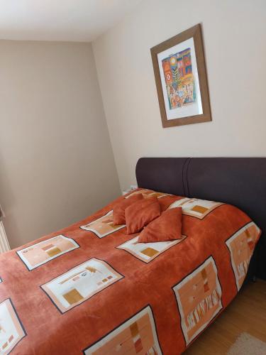 Postel nebo postele na pokoji v ubytování Orgona Apartman- és Nyaralóház