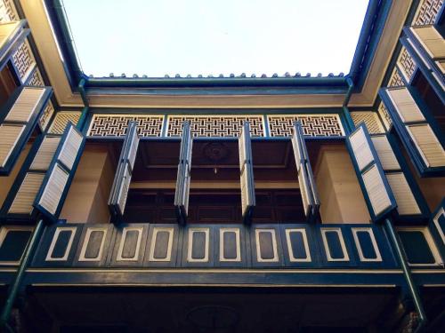 a close up of the front of a building at Adimulia Hotel Medan in Medan