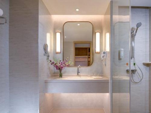 Ένα μπάνιο στο Vienna International Hotel Chengdu New Global Exhibition Center