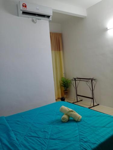 Postel nebo postele na pokoji v ubytování ALOR SETAR SUPERIOR ROOM VISTANA INDAH GUESTHOUSE by Zenith Smart