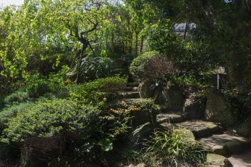 Κήπος έξω από το Villa Arancia