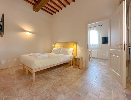 Кровать или кровати в номере Agriturismo Tenuta i 4 venti