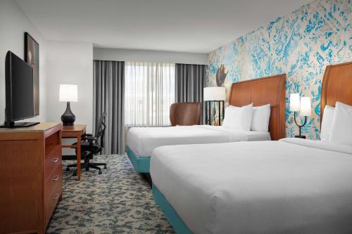 Postel nebo postele na pokoji v ubytování Hilton Garden Inn Fort Worth Medical Center