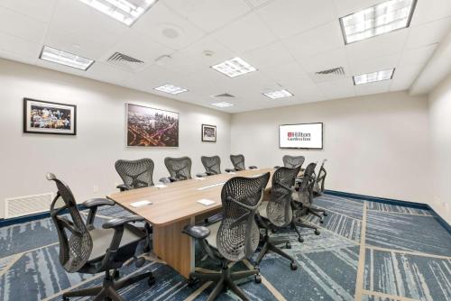 a conference room with a long table and chairs at Hilton Garden Inn LAX - El Segundo in El Segundo