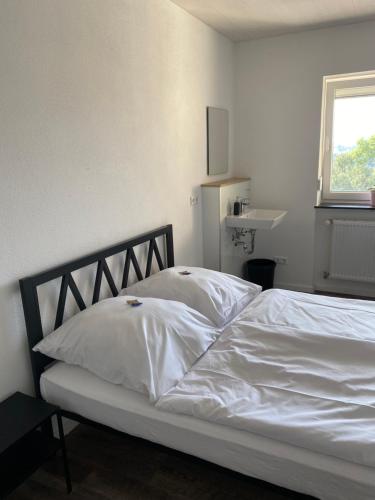 Postel nebo postele na pokoji v ubytování Adventure Resort Jagsttal
