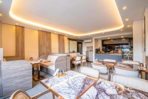 a restaurant with tables and chairs and a bar at 216 Bosphorus in Istanbul