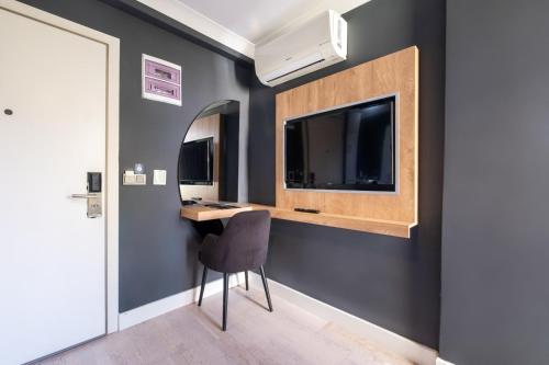 a home office with a desk and a mirror at 216 Bosphorus in Istanbul
