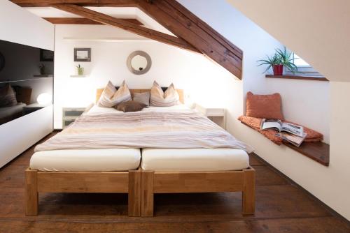 Cama o camas de una habitación en Wirt Weissau