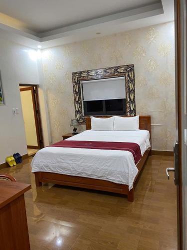 a bedroom with a large bed in a room at Luxury Airport Hotel - Convenient & Friendly in Hanoi